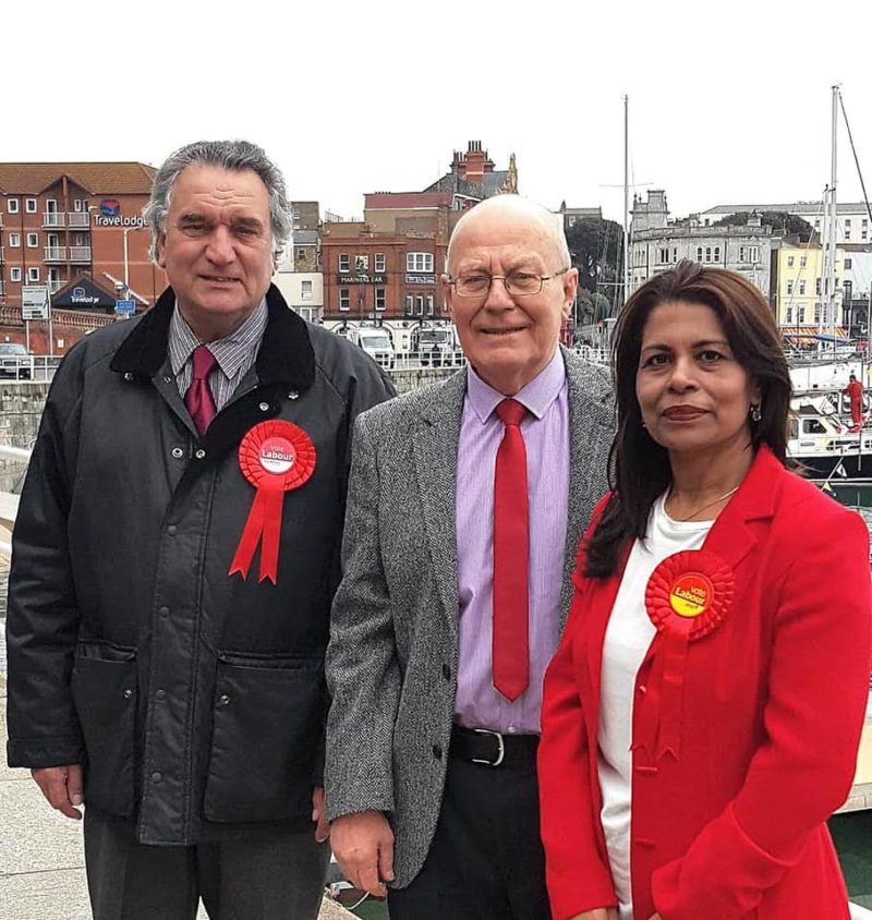 Cllr Peter Campbell standing between Cllr Raushan Ara and Tom King by Ramsgate Royal Harbour